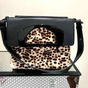 Christian Louboutin authentic black leather/soft animal print handbag